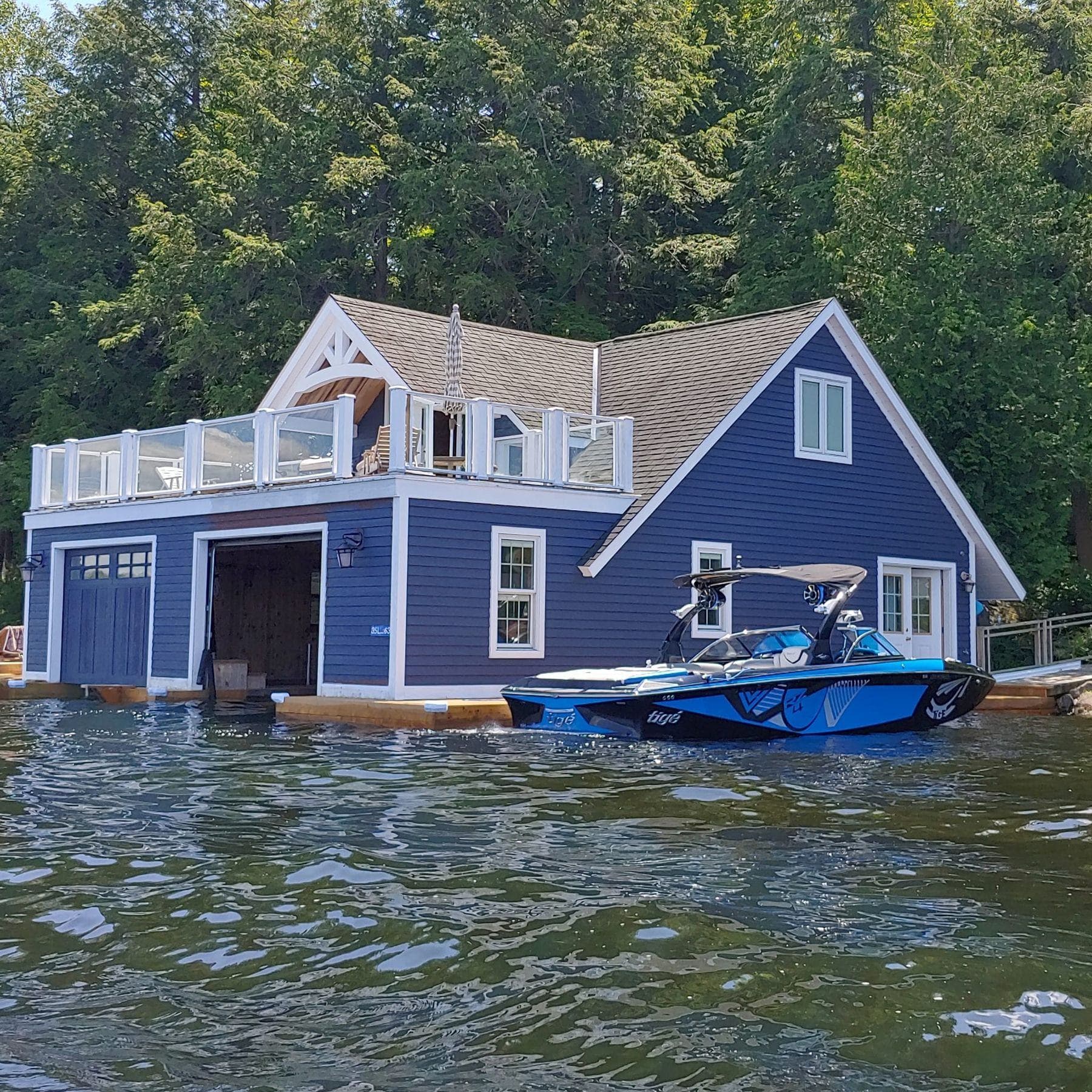 Lakeside Boathouse Refresh: boathouse exterior painting in Muskoka Lakes, Muskoka, Ontario